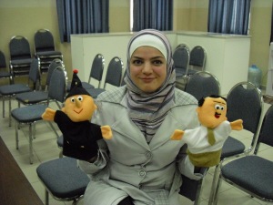 Jordan counselor with puppets